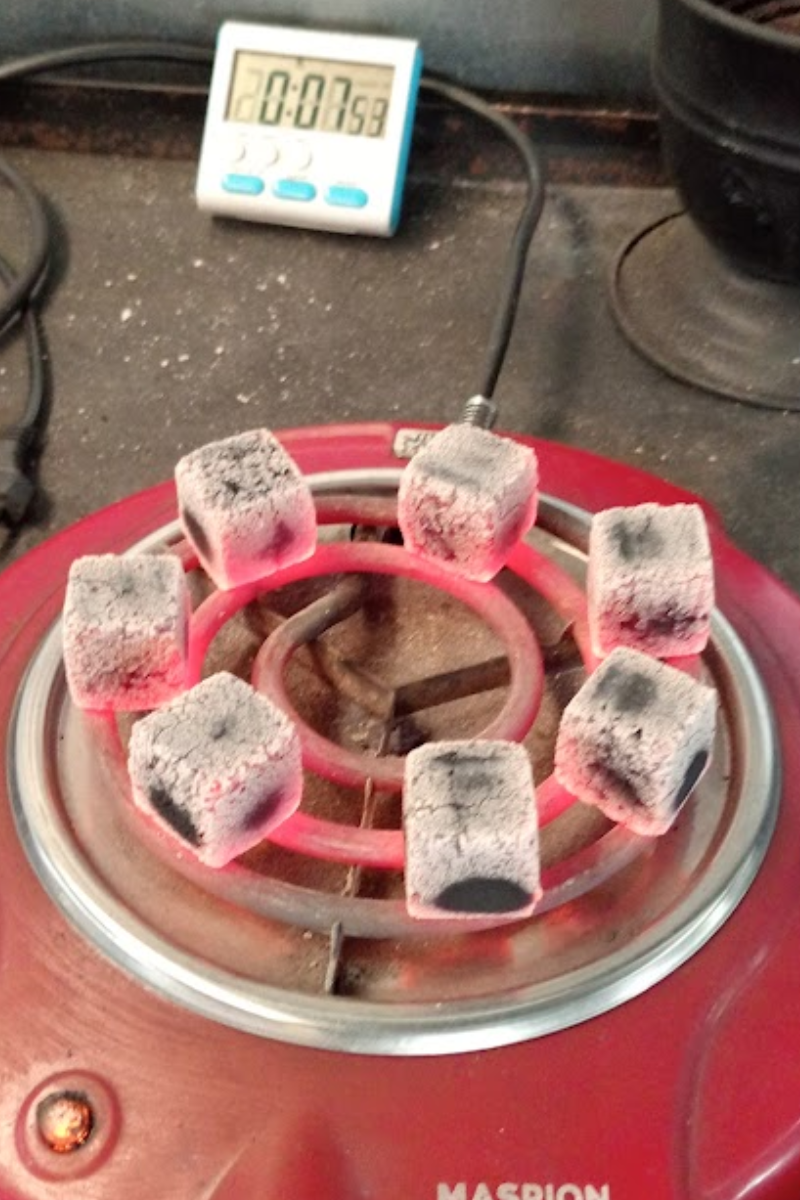 Premium Coconut Charcoal Cube 22 mm (Grade ABB) - Ignition Phase at 10m: Ready for bowl